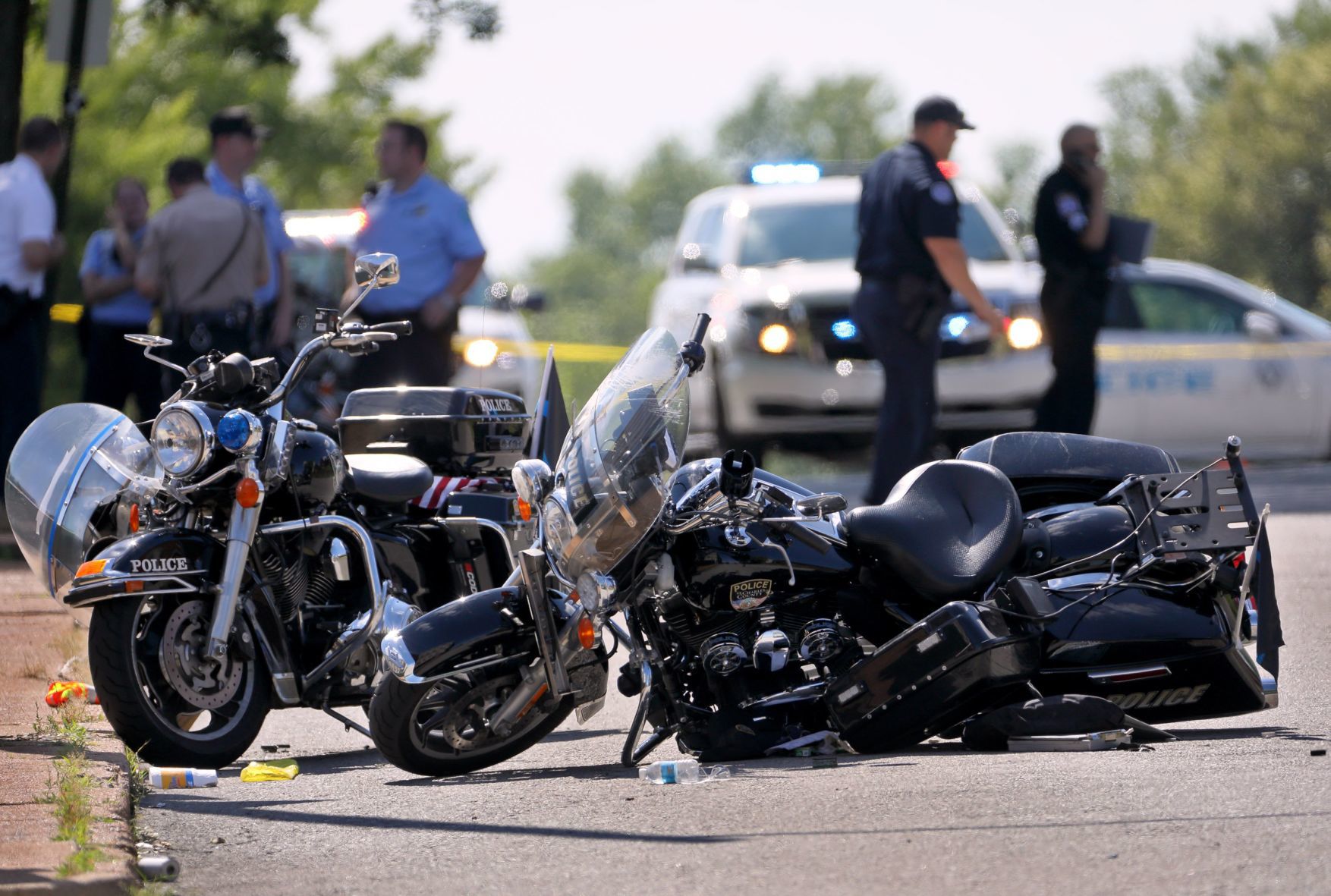 Motorcycle cops injured in Langsdorf motorcade